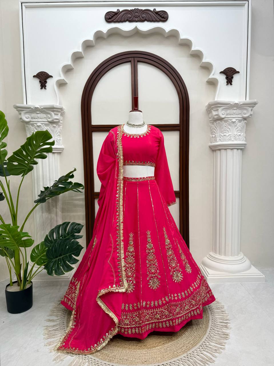 Radiant Rani Pink Silk Lehenga Choli Adorned with Opulent Heritage Floral Motifs and Intricate Zari Borders